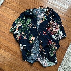 Open light weight cardigan.